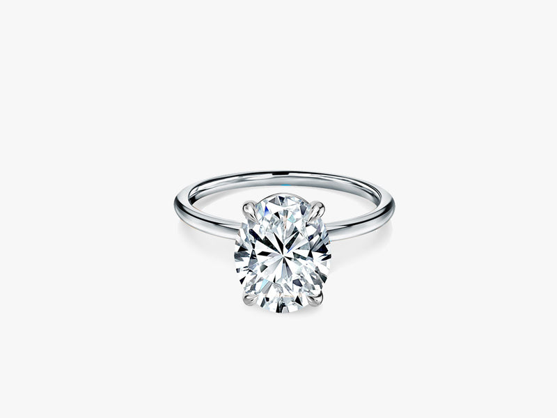 SIGNATURE Oval Cut Verlobungsring mit Diamant in 4-Krabbenfassung